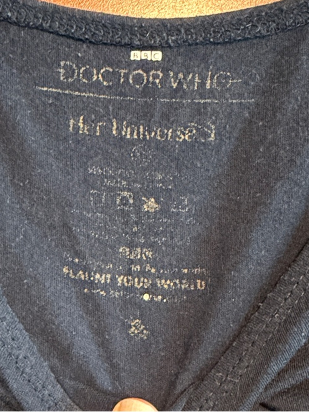 Her Universe 13th Doctor Who Navy Short Sleeve Tee with Multicolor Chest Stripes - Picture 2 of 3